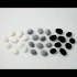 24 Black ceramic pebbles